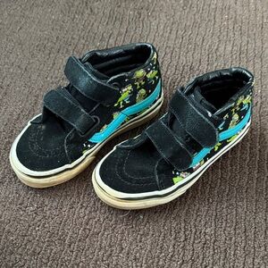 Vans Kids Black Sneakers with Bright Blue Stripe and Green Cartoon Accents